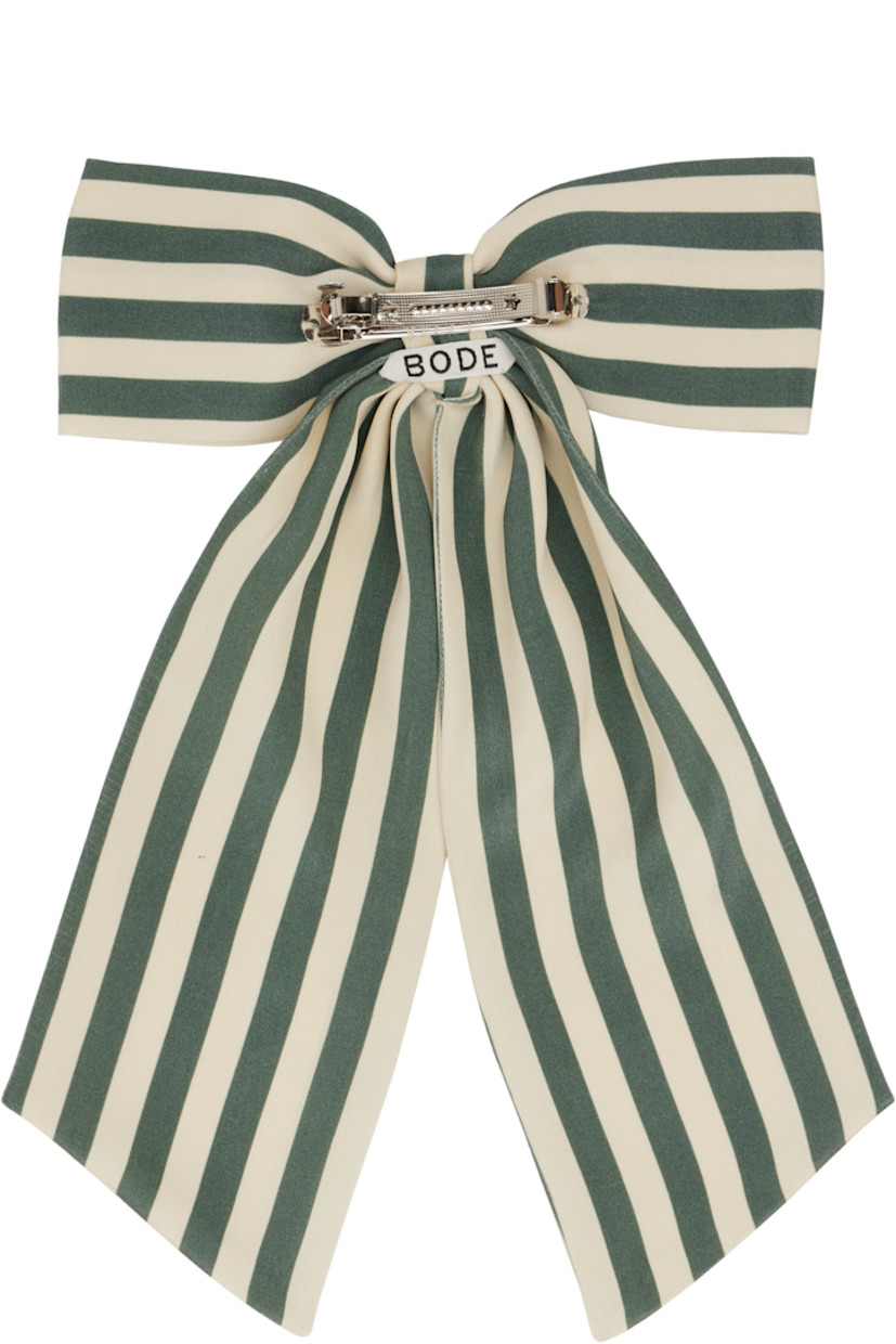Handcrafted silk satin barrette in green & off-white.

· Stripes throughout
· Bow at face
· Logo patch at back face
· Barrette fastening
· H12" x W8.5"

This item is part of a limited run of 23.

Supplier color: Green cream