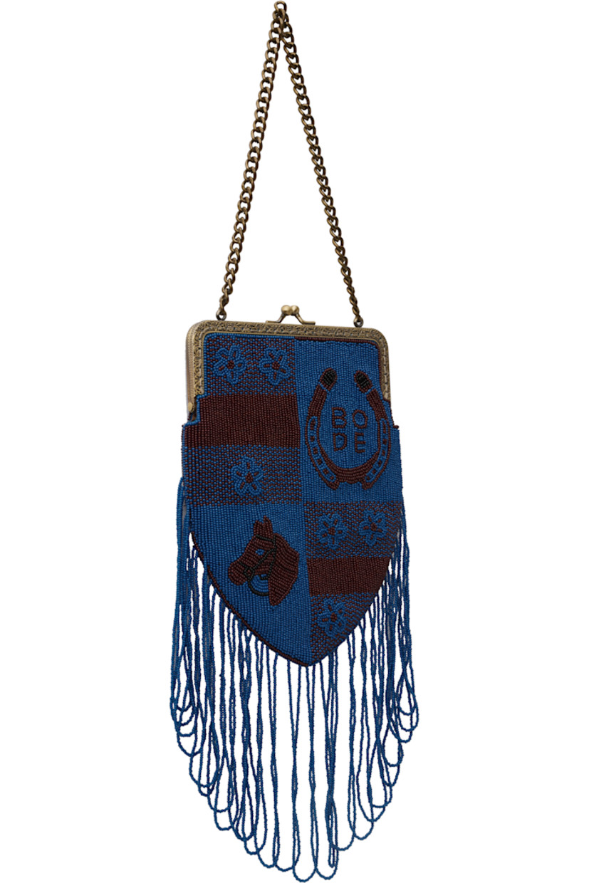 Beaded canvas top handle bag in blue and burgundy.

· Graphics throughout
· Curb chain carry handle
· Logo at face
· Beaded fringe trim at base
· Kiss-lock closure
· Floral pattern embroidered at interior
· Satin lining
· H8.5" x W6"

This item is part of a limited run of 21.

Supplier color: Orange/Blue