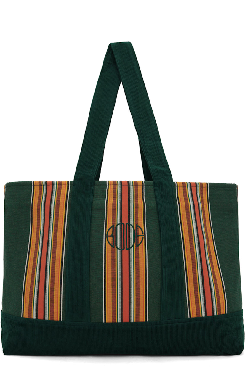 Cotton canvas and corduroy tote in green.

· Jacquard stripes throughout
· Fixed shoulder straps
· Logo embroidered at face and back face
· Open throat
· Patch pocket at interior
· Canvas lining
· H16.5" x W27" x D6"

Supplier color: Green/Multi