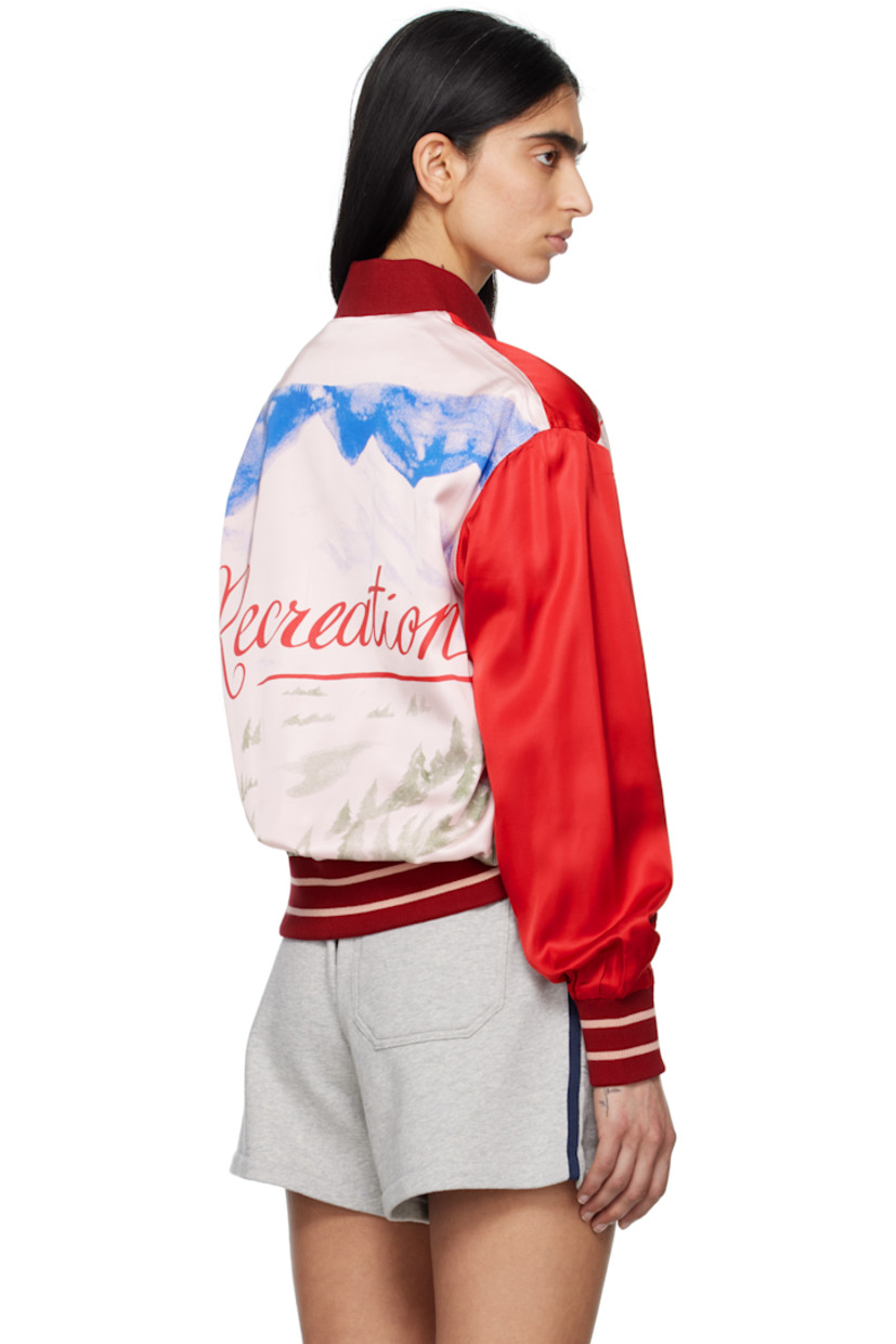 Viscose- and modal-blend satin jacket. 

· Rib-knit stand collar, hem, and cuffs
· Button closure
· Hand-printed text at chest and back 
· Welt pockets
· Stripes at hem and cuffs
· Hand-printed graphic at back
· Full cotton poplin lining

This item is part of a limited run of 68.

Supplier color: Multi