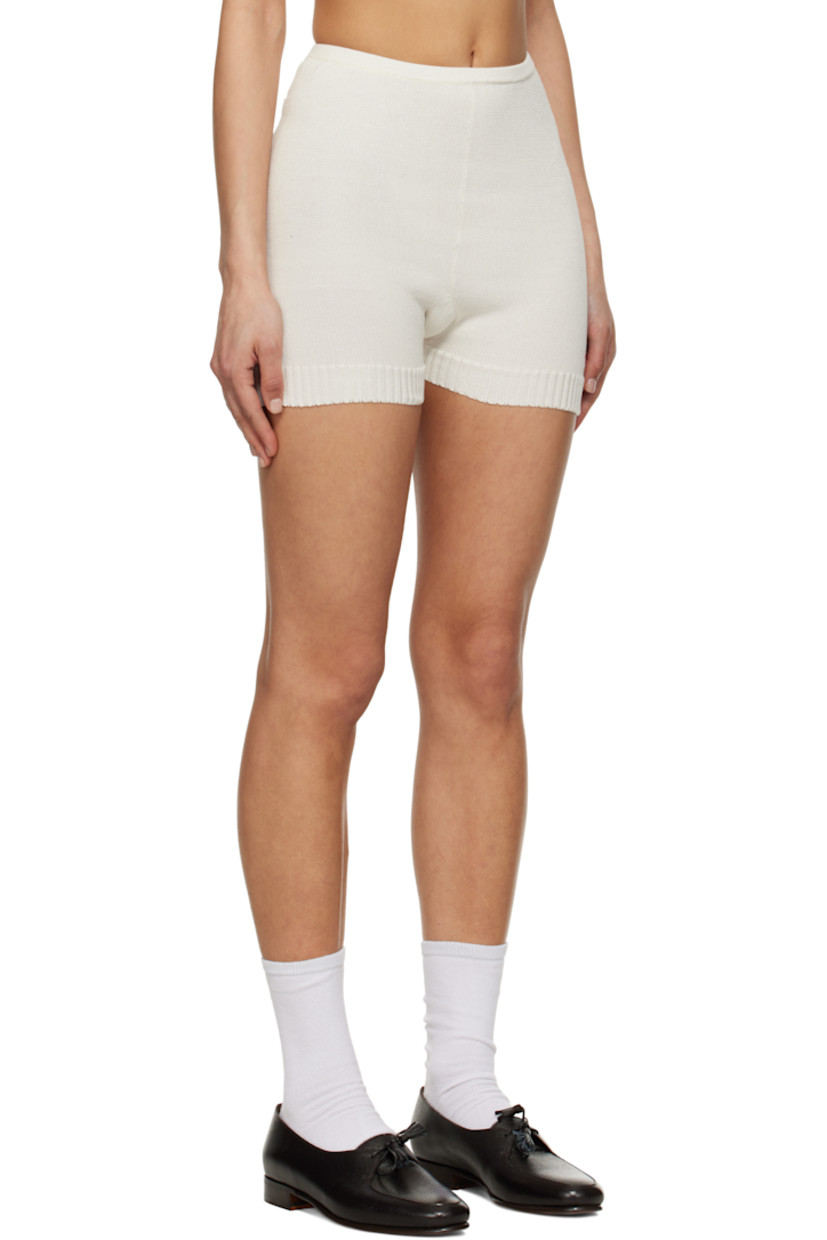 Knit cotton shorts. 

· Elasticized waistband
· Single-pocket styling
· Gusset at inseam
· Jacquard logo at leg
· Rib-knit cuffs

This item is part of a limited run of 32.

Supplier color: Ivory