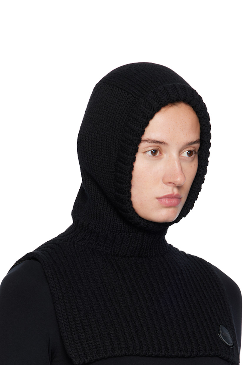 Rib-knit virgin wool balaclava. Leather logo patch at face.

Part of the Moncler Genius x EE72 by Edward Enninful collaboration.

Supplier color: Black