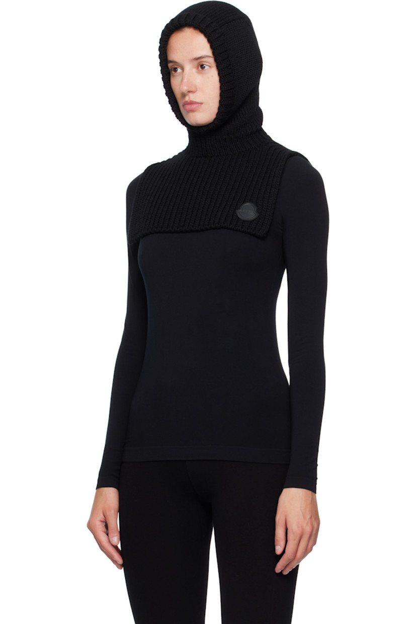 Rib-knit virgin wool balaclava. Leather logo patch at face.

Part of the Moncler Genius x EE72 by Edward Enninful collaboration.

Supplier color: Black