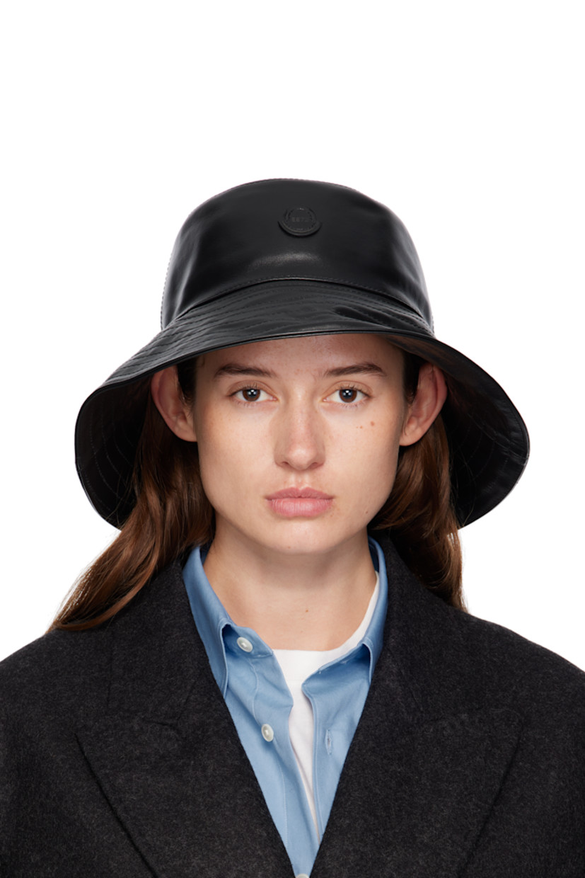 Buffed leather bucket hat. 

· Logo appliqué at face
· Quilted brim 
· Cotton grosgrain browband
· Cotton twill lining

Part of the Moncler Genius x EE72 by Edward Enninful collaboration.

Supplier color: Black