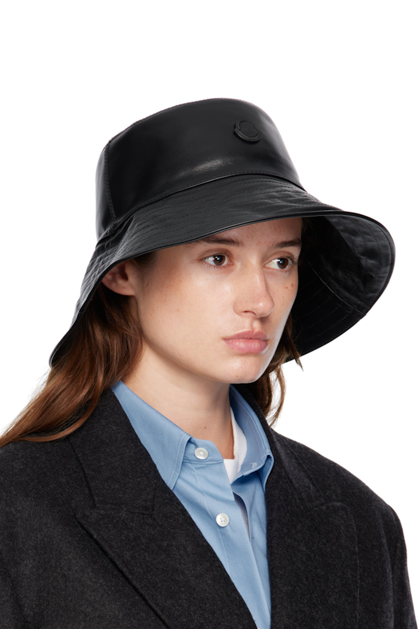Buffed leather bucket hat. 

· Logo appliqué at face
· Quilted brim 
· Cotton grosgrain browband
· Cotton twill lining

Part of the Moncler Genius x EE72 by Edward Enninful collaboration.

Supplier color: Black