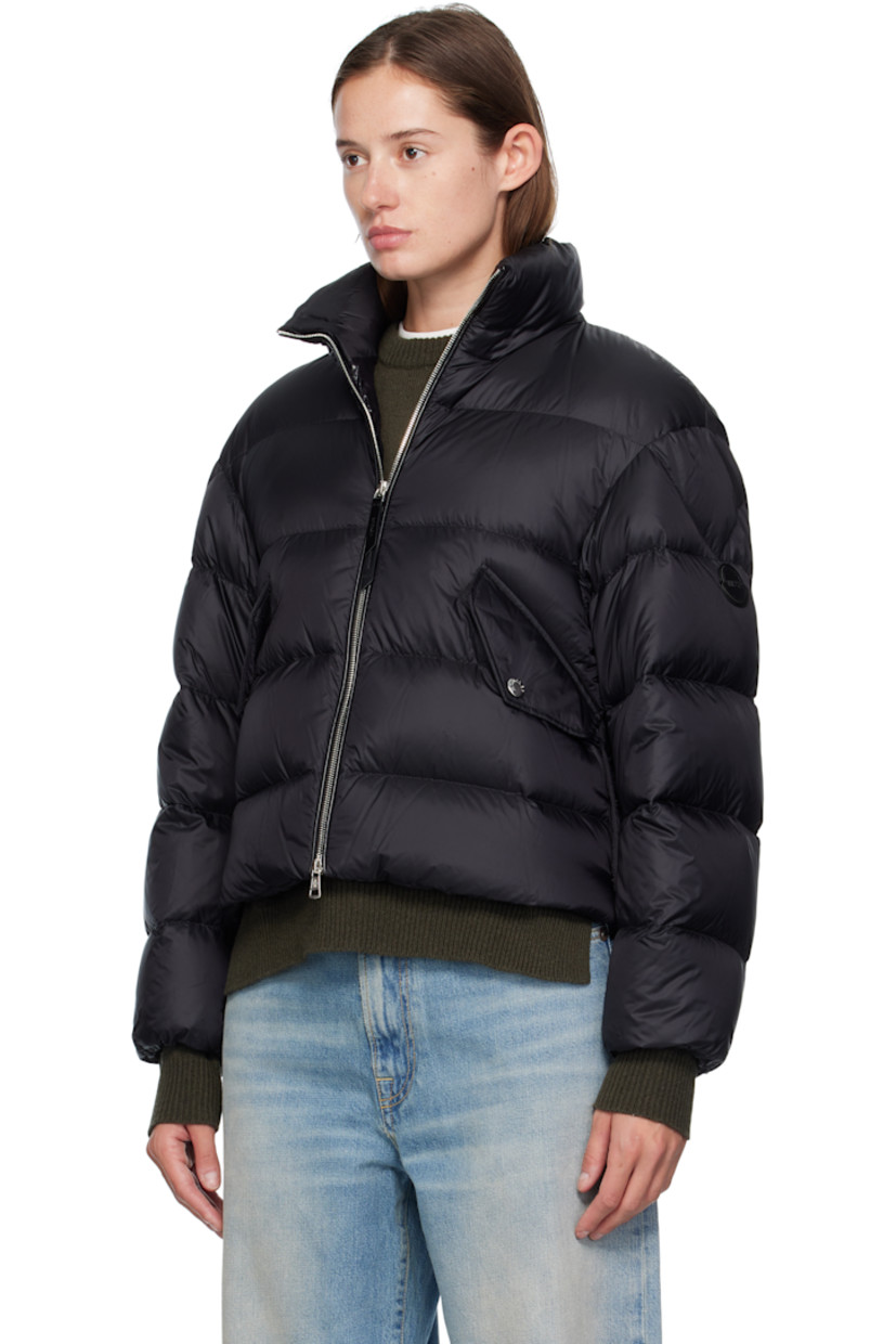 Quilted down-filled nylon taffeta jacket.

· DIST-certified down
· Funnel neck
· Two-way zip closure
· Flap pockets at waist
· Concealed bungee-style drawstring at cropped hem
· Rounded droptail hem
· Press-stud vent at side seams
· Leather logo patch at sleeve
· Elasticized cuffs
· Detachable webbing shoulder straps at interior
· Full nylon laqué lining
· Logo-engraved silver-tone hardware

Part of the Moncler Genius x EE72 by Edward Enninful collaboration.

Supplier color: Black

Fill: 90% goose down, 10% goose feather.