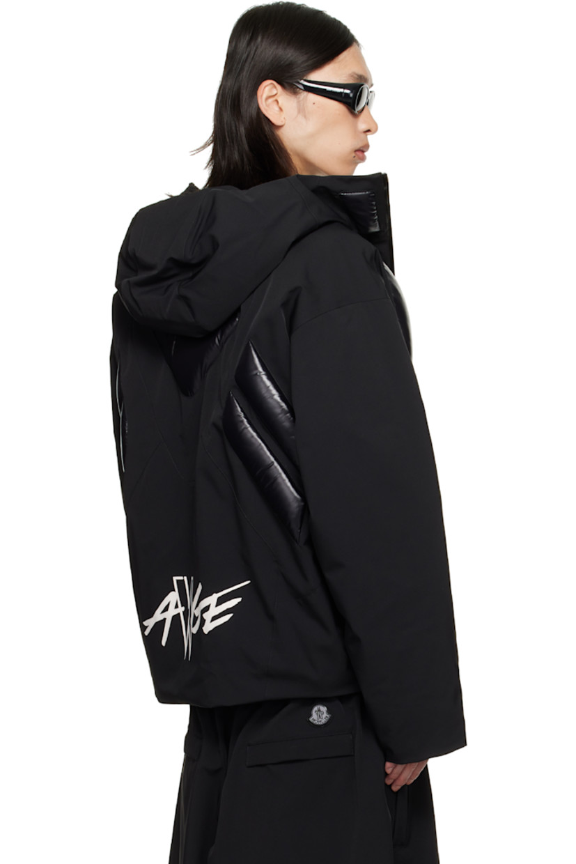 Down-filled stretch nylon taffeta jacket.

· DIST-certified down
· Hood at funnel neck
· Two-way zip closure
· Welt pockets at front
· Bungee-style drawstring at hem
· Logo patch at sleeve
· Logo printed at back hem
· Full quilted satin lining

Part of the Moncler Genius x AWGE by A$AP Rocky collaboration.

Supplier color: Black  

Fill: 90% goose down, 10% feather.