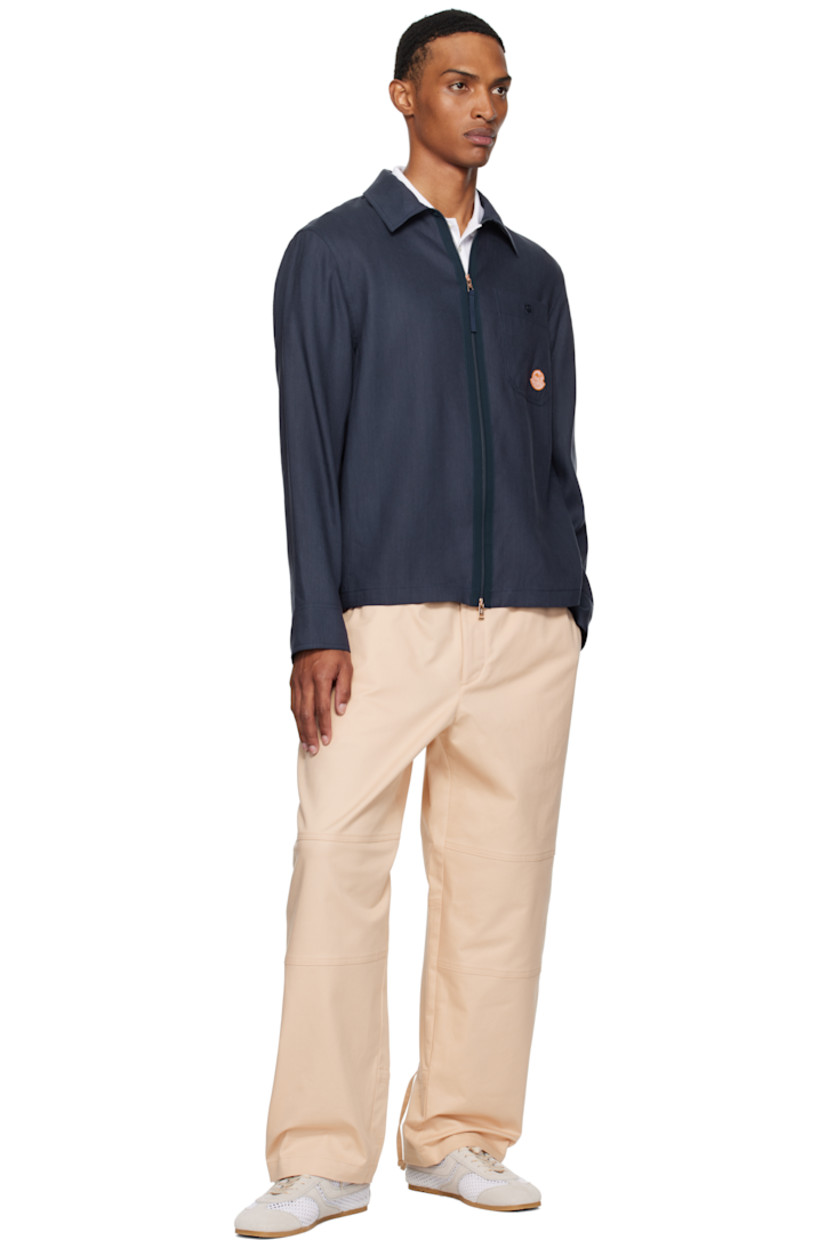 Linen-blend hopsack shirt.

· Spread collar
· Two-way zip closure
· Patch pocket and logo graphic patch at chest
· Buttoned barrel cuffs

Part of the Moncler x Gilga Farm collaboration.

Supplier color: Starless night