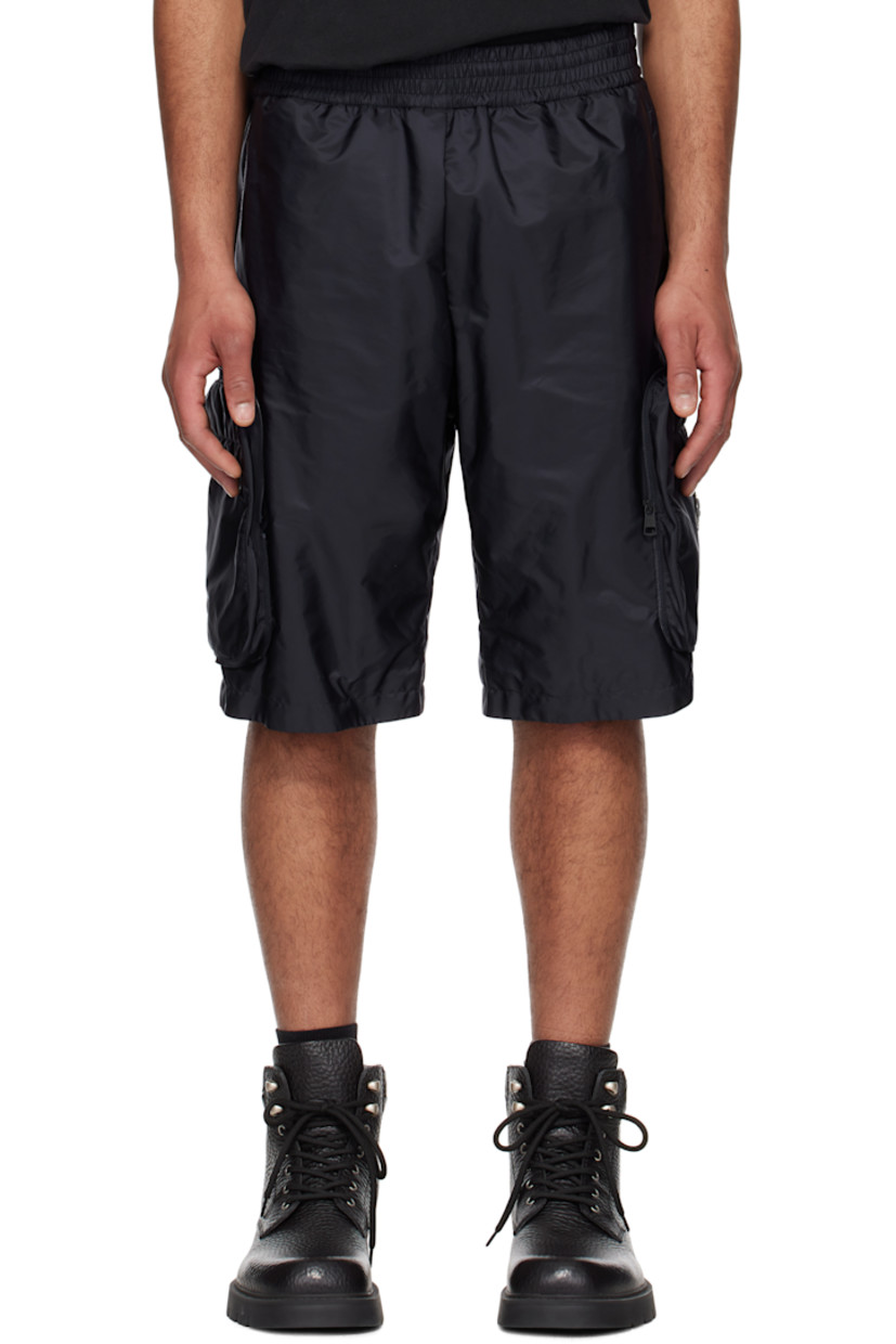 Nylon taffeta shorts.

· Concealed drawstring at elasticized waistband
· Two-pocket styling
· Bellows pocket at outseams
· Logo patch with hardware at outseam
· Full mesh lining

Part of the Moncler Genius x Mercedes-Benz by NIGO collaboration.

Supplier color: Dark navy blue