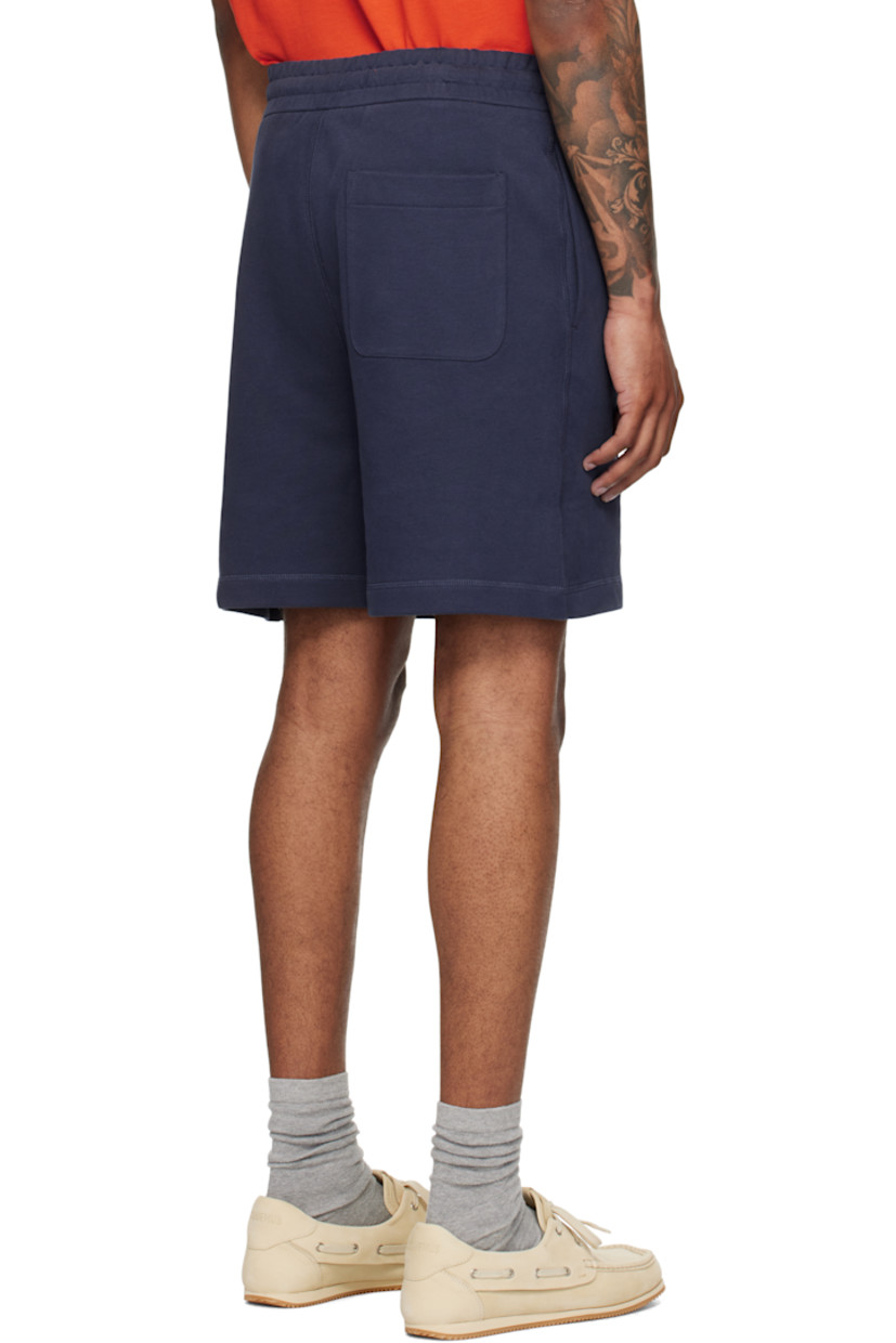 French terry shorts.

· Drawstring at elasticized waistband
· Three-pocket styling
· Embroidered logo patch at front

Part of the Moncler Genius x Gilga Farm collaboration.

Supplier color: Starless night