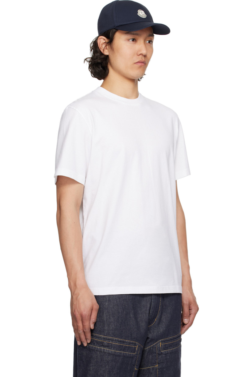 Cotton jersey T-shirt.

· Rib-knit crewneck
· Felted logo patch with hardware at cuff
· Logo and graphic printed at back

Part of the Moncler Genius x Mercedes-Benz by NIGO collaboration. 

Supplier color: Brilliant white