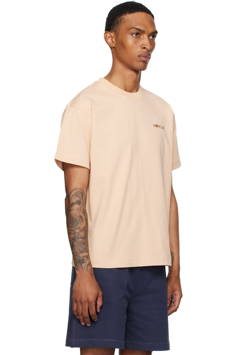 Cotton jersey T-shirt.

· Rib-knit crewneck
· Logo graphic embroidered at chest
· Embroidered logo patch at sleeve

Part of the Moncler Genius x Gilga Farm collaboration.

Supplier color: Gilga orange