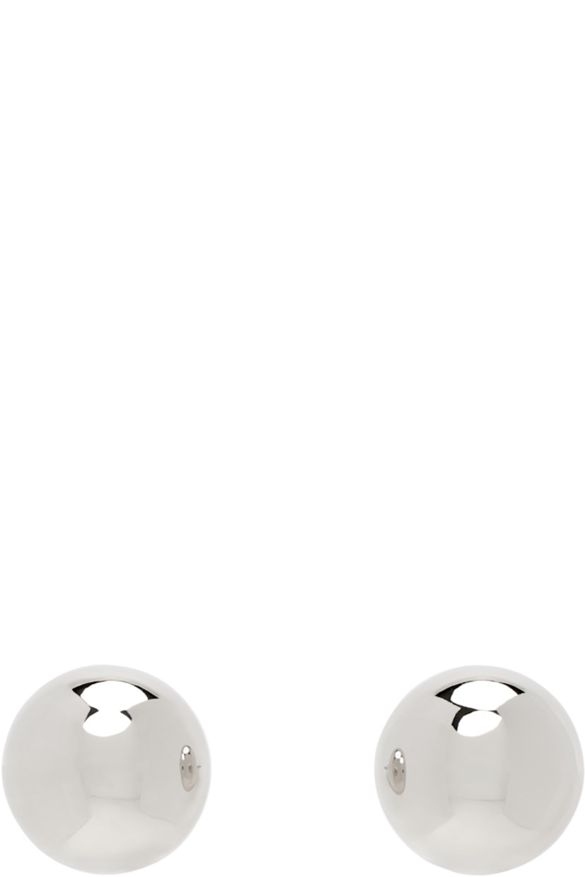 Pair of stud earrings in silver-tone brass.

· Post-stud fastening
· D0.75"

Supplier color: Silver
