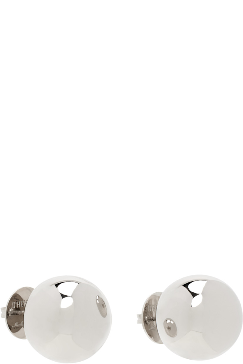 Pair of stud earrings in silver-tone brass.

· Post-stud fastening
· D0.75"

Supplier color: Silver