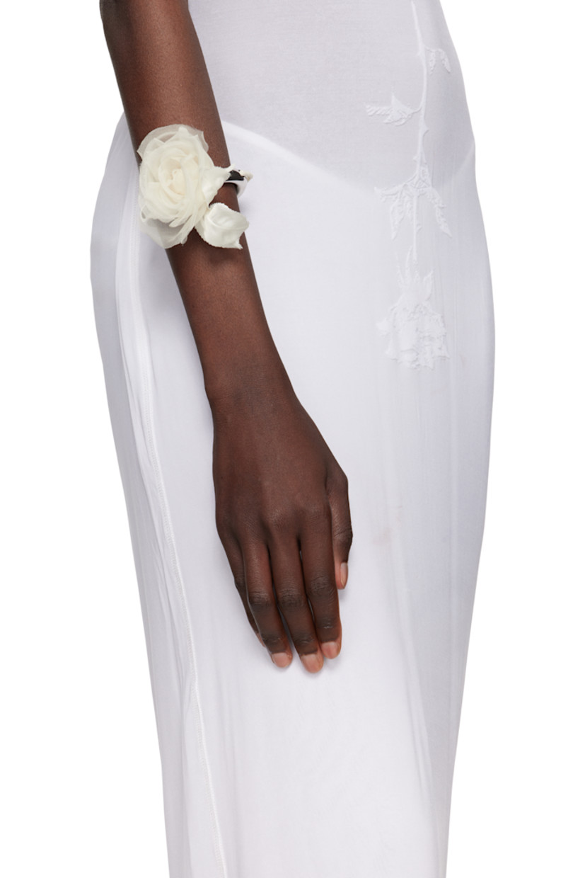 Open cuff bracelet in silver-tone brass.

· Floral accent at end
· D2.75"

Part of the exclusive SSENSE Bridal capsule.

Supplier color: Silver/Yellow