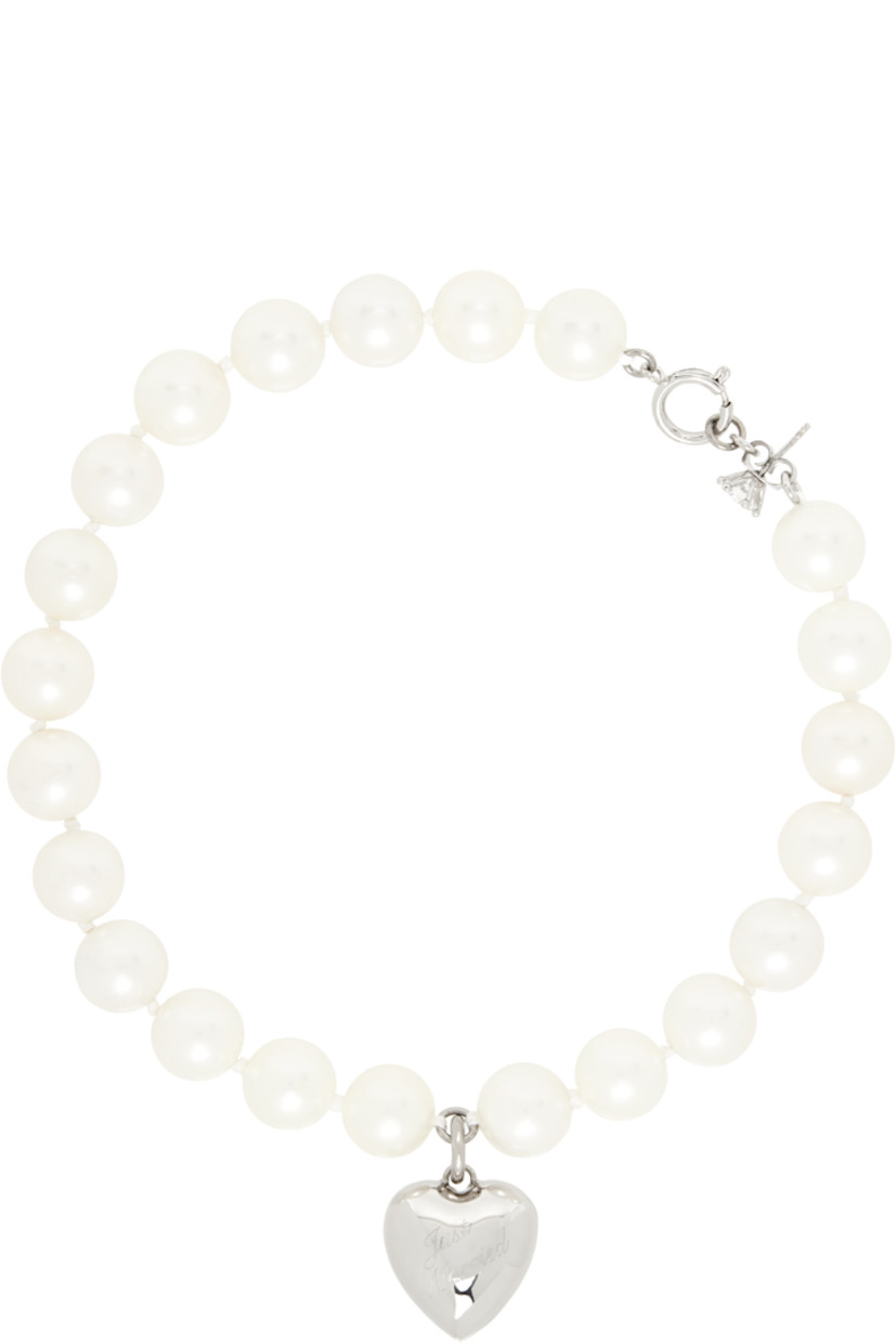 Beaded faux-pearl necklace in white.

· Prong-set crystal and graphic charm at ends
· Spring-ring fastening
· Silver-tone brass hardware
· L14.5"

Part of the exclusive SSENSE Bridal capsule.

Supplier color: White pearl/Silver