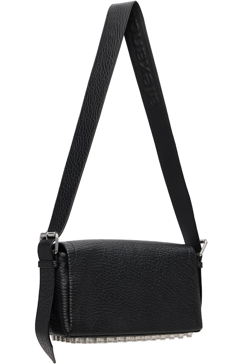 Grained lambskin shoulder bag.

· Adjustable and detachable shoulder strap
· Includes alternate crossbody strap
· Flat-head studs at base
· Flap closure with magnetic tab
· Phone slot, zip pocket, and card slot at interior
· Poplin lining
· H8" x W13" x D4.5"

Supplier color: Black