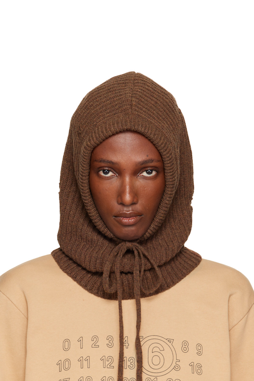 Rib-knit wool-blend hood.

· Distressing throughout
· Drawstring at face
· Logo patch at back face

Supplier color: Brown melange