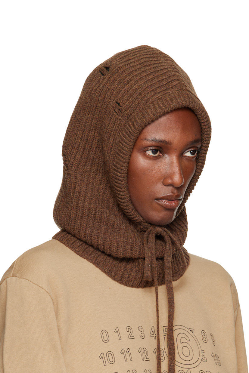 Rib-knit wool-blend hood.

· Distressing throughout
· Drawstring at face
· Logo patch at back face

Supplier color: Brown melange