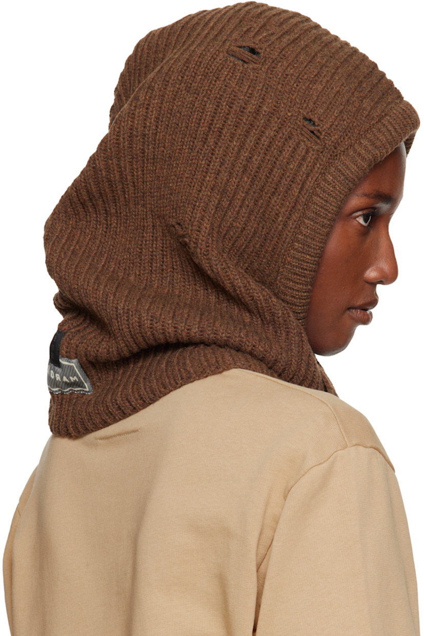 Rib-knit wool-blend hood.

· Distressing throughout
· Drawstring at face
· Logo patch at back face

Supplier color: Brown melange
