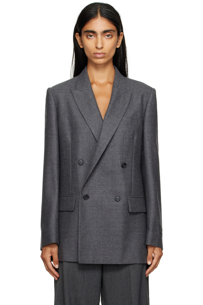 Virgin wool flannel blazer.

· Peaked lapel
· Double-breasted button closure
· Welt pocket at chest
· Flap pockets at front
· Padded shoulders
· Logo patch at cuff
· Surgeon's cuffs
· White stitching at back collar
· Vents at back hem
· Welt pocket at interior
· Full satin lining

Supplier color: Dark grey