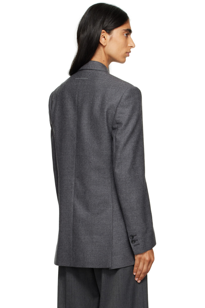 Virgin wool flannel blazer.

· Peaked lapel
· Double-breasted button closure
· Welt pocket at chest
· Flap pockets at front
· Padded shoulders
· Logo patch at cuff
· Surgeon's cuffs
· White stitching at back collar
· Vents at back hem
· Welt pocket at interior
· Full satin lining

Supplier color: Dark grey