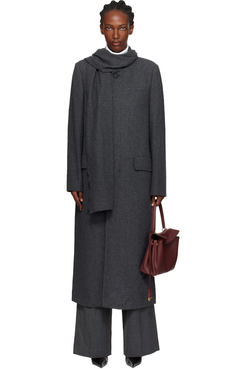 Wool-blend melton coat.

· Integrated scarf at notched lapel
· Button closure
· Flap pockets at front
· White stitching at back collar
· Central vent at back hem
· Welt pocket at interior
· Full satin lining

Supplier color: Dark grey Melange