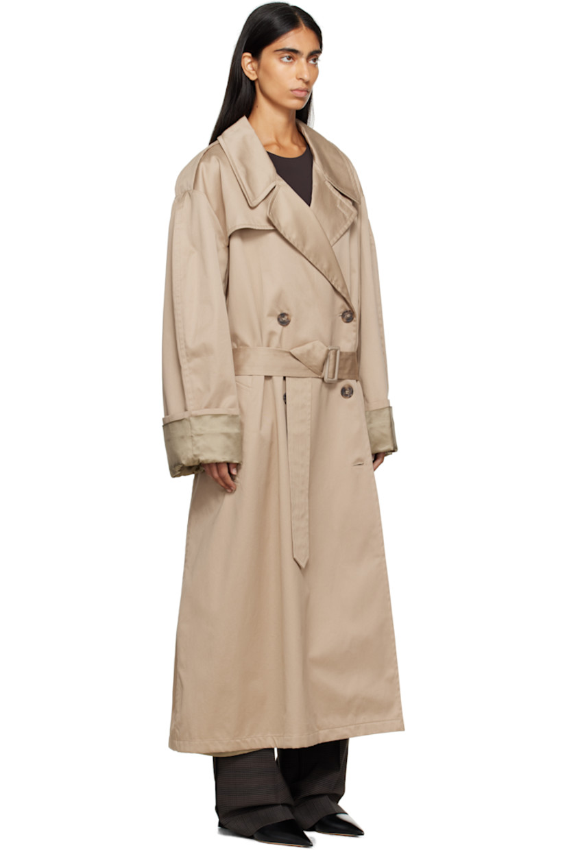 Cotton gabardine trench coat.

· Notched lapel
· Double-breasted button closure
· Storm flap at chest and back
· Belt loops and detachable pin-buckle belt
· Welt pockets at waist
· Epaulets
· Rolled cuffs
· White stitching at back collar
· Central vent at back hem
· Welt pocket at interior
· Full satin lining

Supplier color: Sand