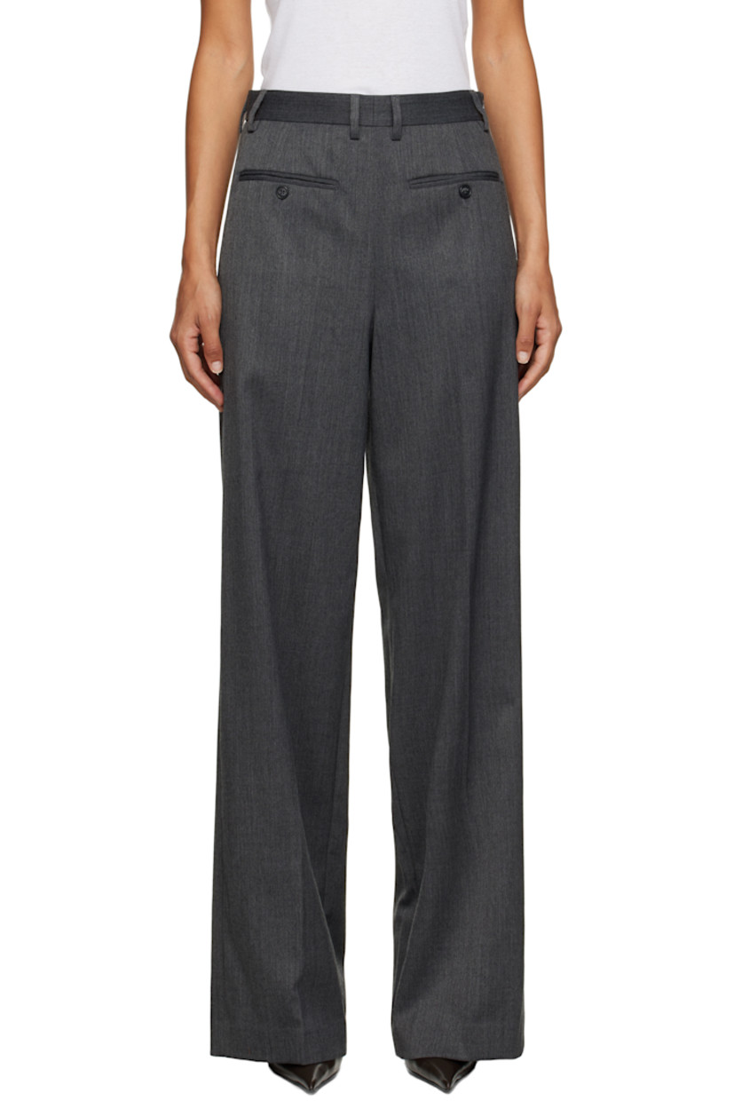 Stretch virgin wool-blend twill trousers.

· Reverse construction
· Wide-leg
· Belt loops
· Modified four-pocket styling
· Creased legs
· Zip closure at outseam
· White stitching at back

Supplier color: Dark grey