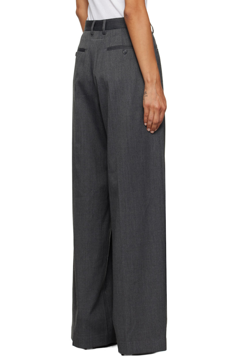 Stretch virgin wool-blend twill trousers.

· Reverse construction
· Wide-leg
· Belt loops
· Modified four-pocket styling
· Creased legs
· Zip closure at outseam
· White stitching at back

Supplier color: Dark grey