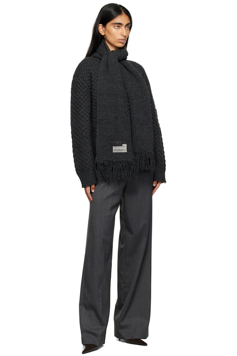 Stretch virgin wool-blend twill trousers.

· Reverse construction
· Wide-leg
· Belt loops
· Modified four-pocket styling
· Creased legs
· Zip closure at outseam
· White stitching at back

Supplier color: Dark grey