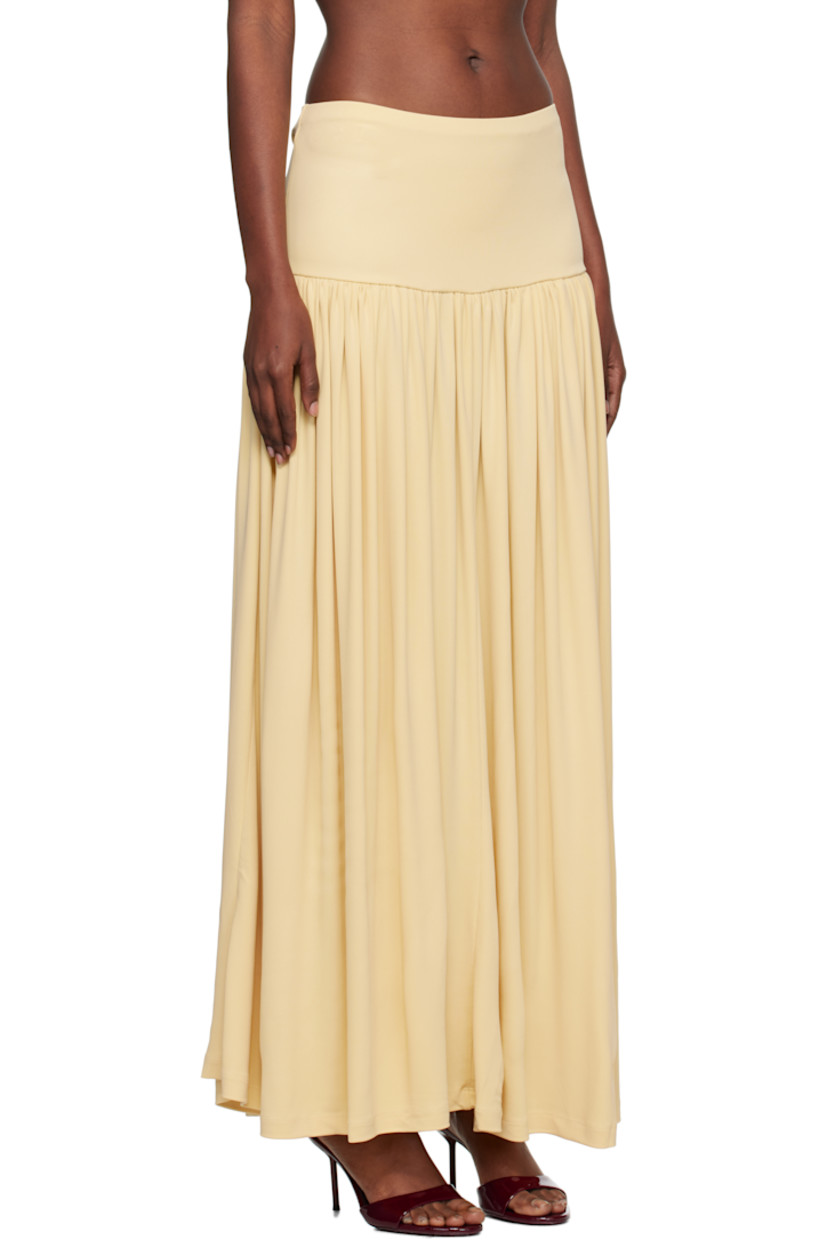 Stretch viscose crêpe jersey maxi skirt.

· Elasticized waistband 
· Gathering at dropped waist
· Partially lined

Supplier color: Buttercream
