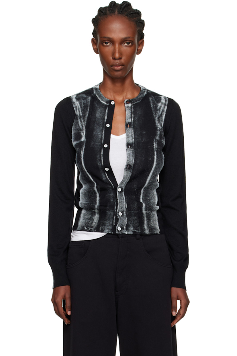 Knit virgin wool-blend cardigan.

�· Rib-knit crewneck, hem, and cuffs
· Button closure
· Spray-dyed detailing at front and sleeves
· White stitching at back collar

Supplier color: Black