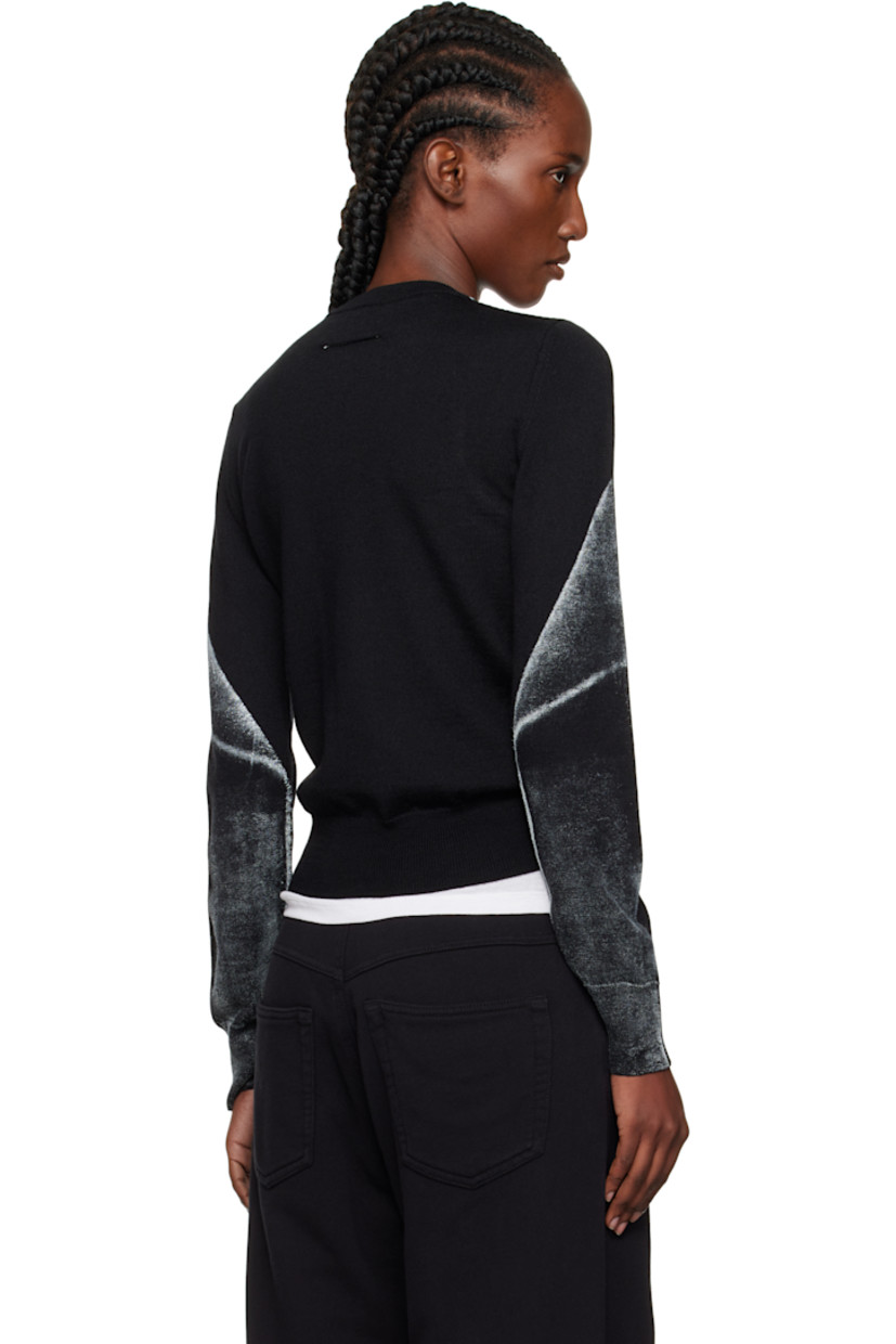 Knit virgin wool-blend cardigan.

· Rib-knit crewneck, hem, and cuffs
· Button closure
· Spray-dyed detailing at front and sleeves
· White stitching at back collar

Supplier color: Black