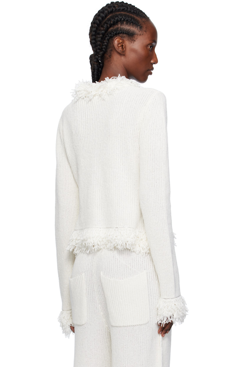 Rib-knit linen- and cotton-blend cardigan.

· Fringed trim at Y-neck, hem, and cuffs
· Self-tie closure

Supplier color: Milk