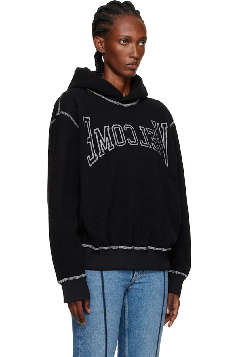 Fleece hoodie.

· Text embroidered at front
· Rib-knit hem and cuffs
· Dropped shoulders
· Contrast stitching in white

Supplier color: Black