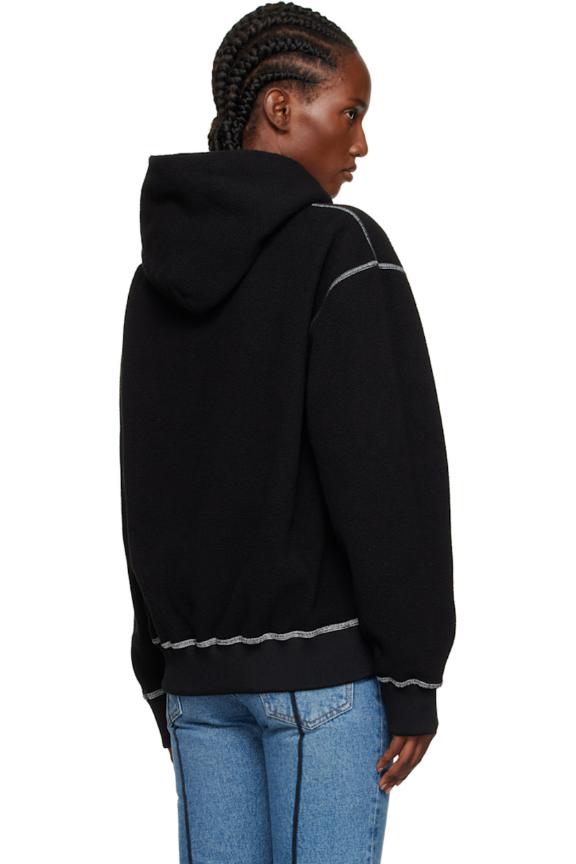 Fleece hoodie.

· Text embroidered at front
· Rib-knit hem and cuffs
· Dropped shoulders
· Contrast stitching in white

Supplier color: Black
