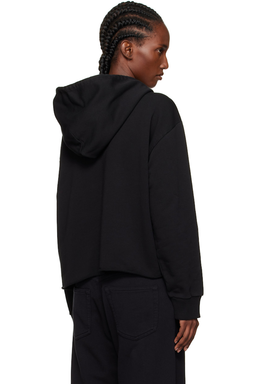 French terry hoodie.

· Drawstring at hood
· Logo patch at chest
· Kangaroo pocket
· Raw edge at hem
· Dropped shoulders
· Rib-knit cuffs
· White stitching at back collar

Supplier color: Black