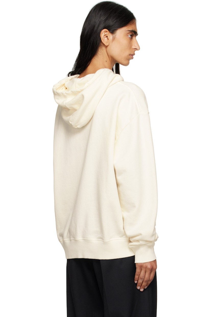 French terry hoodie.

· Drawstring at hood
· Graphic appliqué at front
· Logo embroidered at kangaroo pocket
· Rib-knit hem and cuffs
· White stitching at back collar

Supplier color: Off white