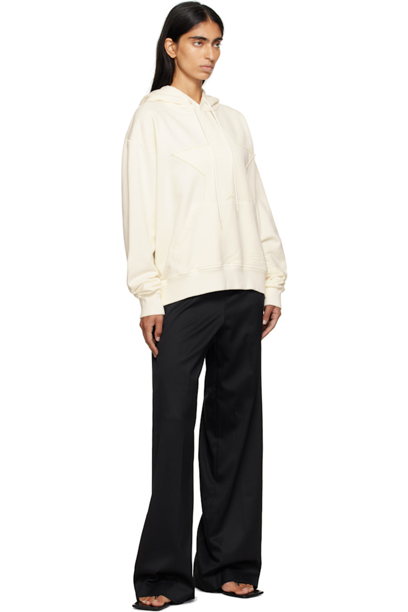 French terry hoodie.

· Drawstring at hood
· Graphic appliqué at front
· Logo embroidered at kangaroo pocket
· Rib-knit hem and cuffs
· White stitching at back collar

Supplier color: Off white