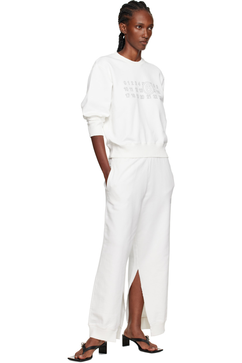 Cotton French terry sweatshirt.

· Rib-knit crewneck, hem, and cuffs
· Logo printed at front
· White stitching at back collar

Supplier color: Off white