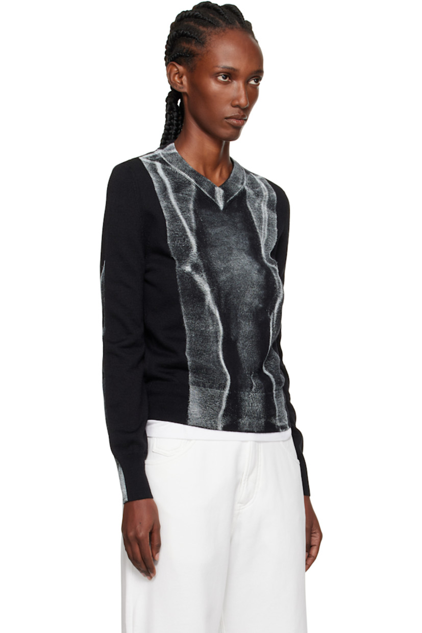 Knit virgin wool-blend sweater.

· Rib-knit V-neck, hem, and cuffs
· Trompe l'oeil graphic printed at front and sleeves
· White stitching at back collar

Supplier color: Black
