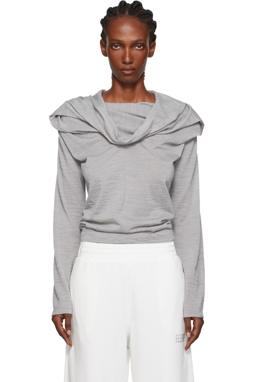 Virgin wool-blend jersey top.

· Draping throughout
· Cowl neck
· Pleats at chest
· White stitching at back collar

Supplier color: Medium grey melange