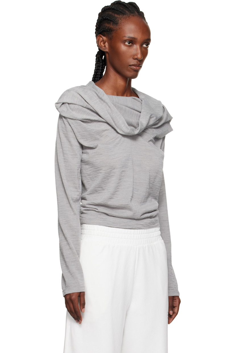 Virgin wool-blend jersey top.

· Draping throughout
· Cowl neck
· Pleats at chest
· White stitching at back collar

Supplier color: Medium grey melange