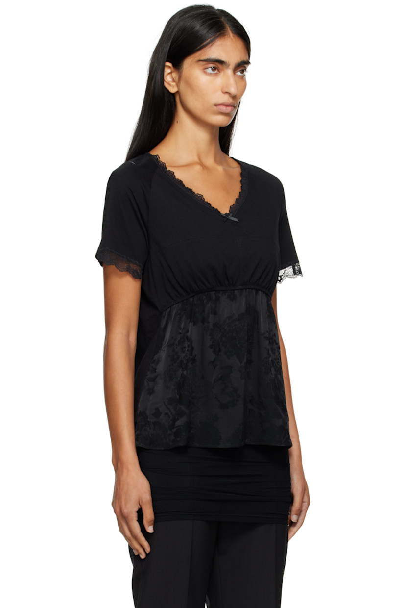 Cotton jersey T-shirt.

· Bow and lace trim at V-neck
· Ruching at front
· Brocade panel with jacquard floral pattern at front 
· Raglan sleeves
· Lace trim at cuffs
· White stitching at shoulder
· Logo embroidered at back

Supplier color: Black