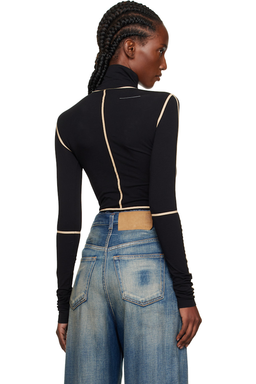 Stretch cotton jersey bodysuit.

· Taped seams throughout
· Turtleneck
· Press-stud fastening at bottom
· White stitching at back collar

Supplier color: Black