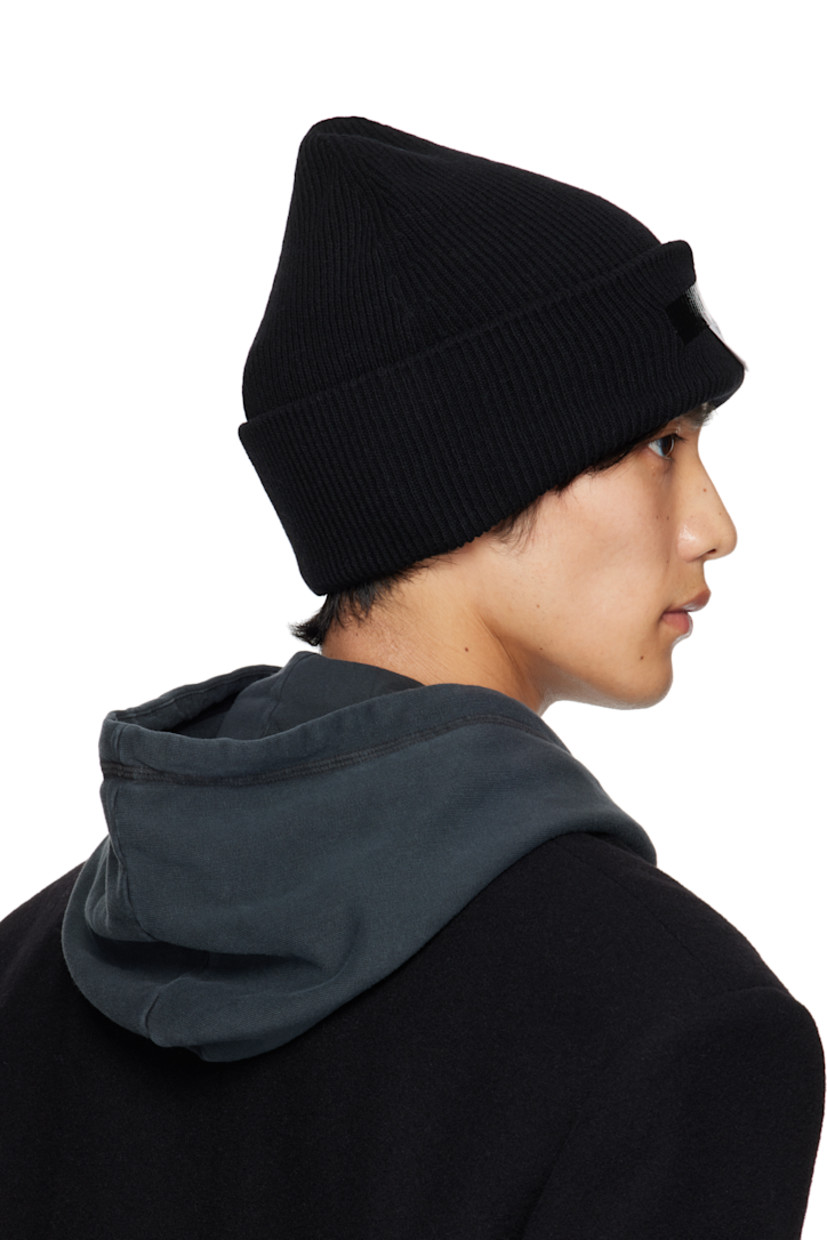 Rib-knit wool-blend beanie. Logo patch at rolled brim.

Supplier color: Black