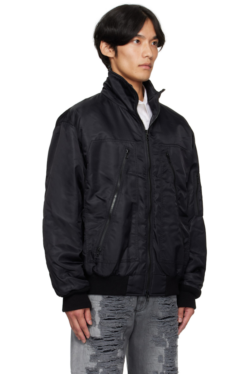 Insulated nylon twill bomber jacket. 

· Stand collar
· Two-way zip closure
· Zip pockets at front 
· Rib-knit hem and cuffs 
· Utility pocket and pen slots at sleeve
· White stitching at back collar 
· Patch pocket at interior 
· Quilted viscose satin twill lining 

Supplier color: Black