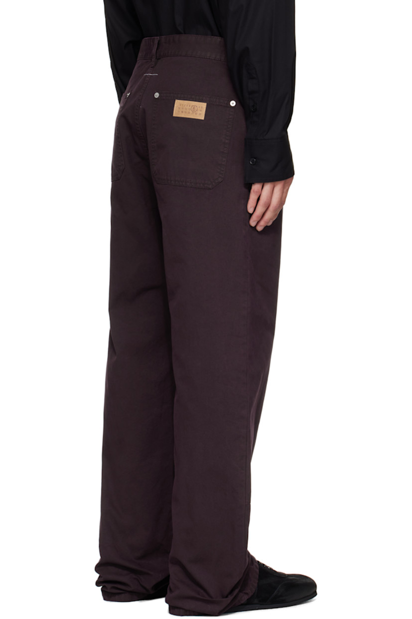 Cotton canvas jeans.

· Belt loops
· Five-pocket styling
· Zip fly 
· Reinforced panel and rivets at legs
· White stitching at back waist
· Logo patch at back pocket 

Supplier color: Dark wine