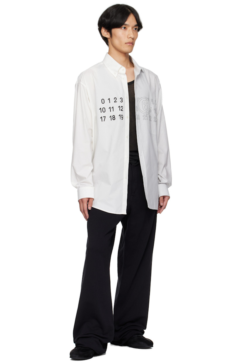 French terry trousers.

· Wide-leg 
· Concealed drawstring at elasticized waistband
· Belt loops
· Zip fly 
· Five-pocket styling
· Raw edge at cuffs 
· White stitching at back waist 

Supplier color: Black